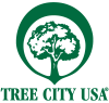 Tree with a green circle around it with the text Tree City USA
