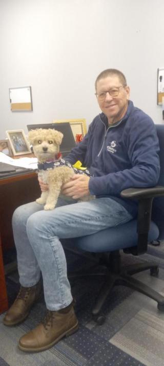 David Clark, Clinton Township Trustee, is pictured with Daisy